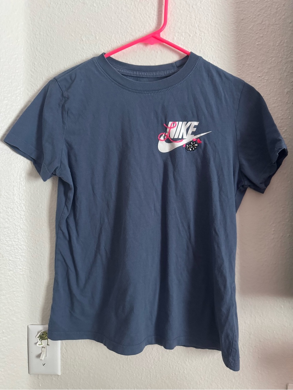 Nike Navy Blue Short Sleeve Tee with White Swoosh and Pink Accent